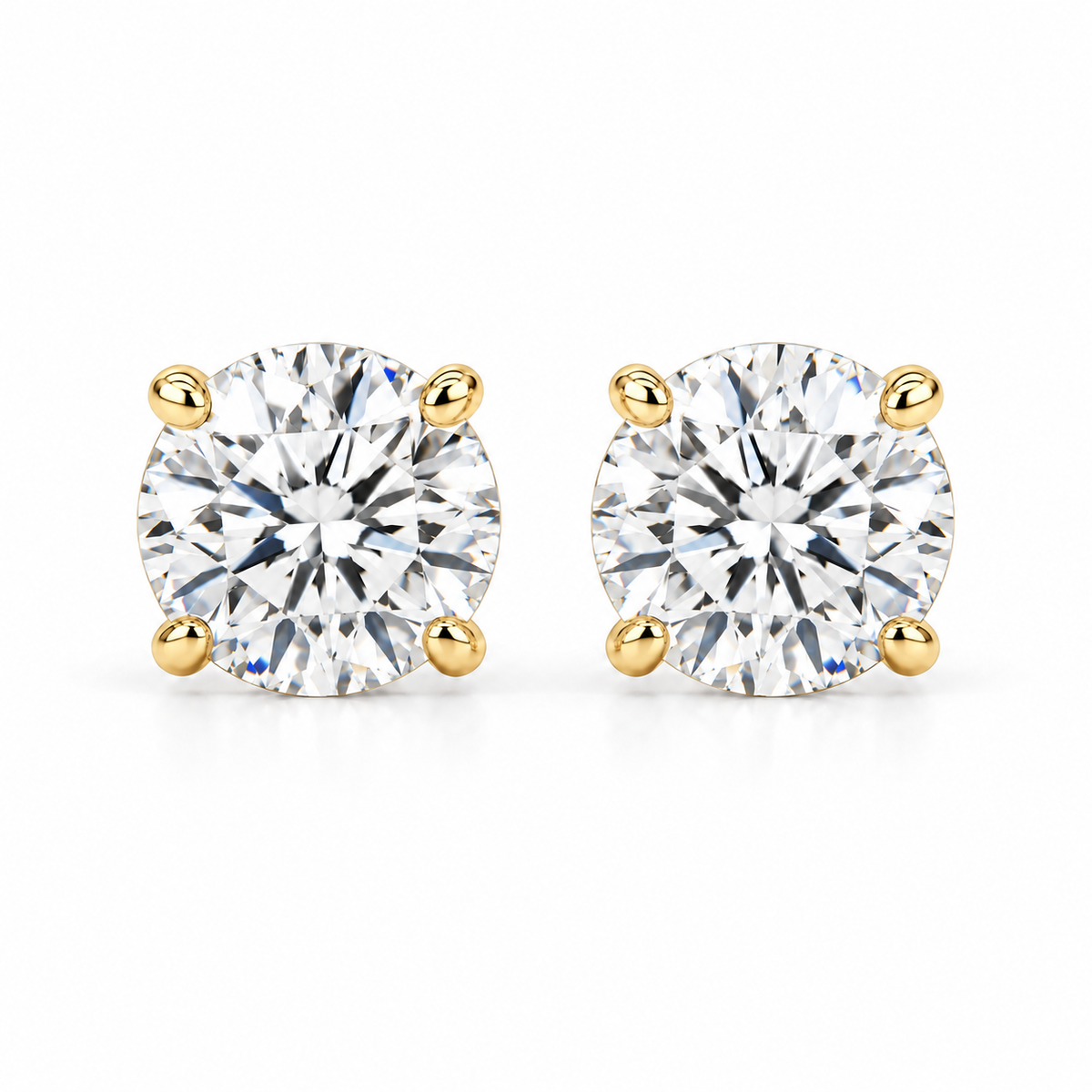 1 carat total weight lab-grown round brilliant diamond stud earrings in 14k yellow gold four-prong settings