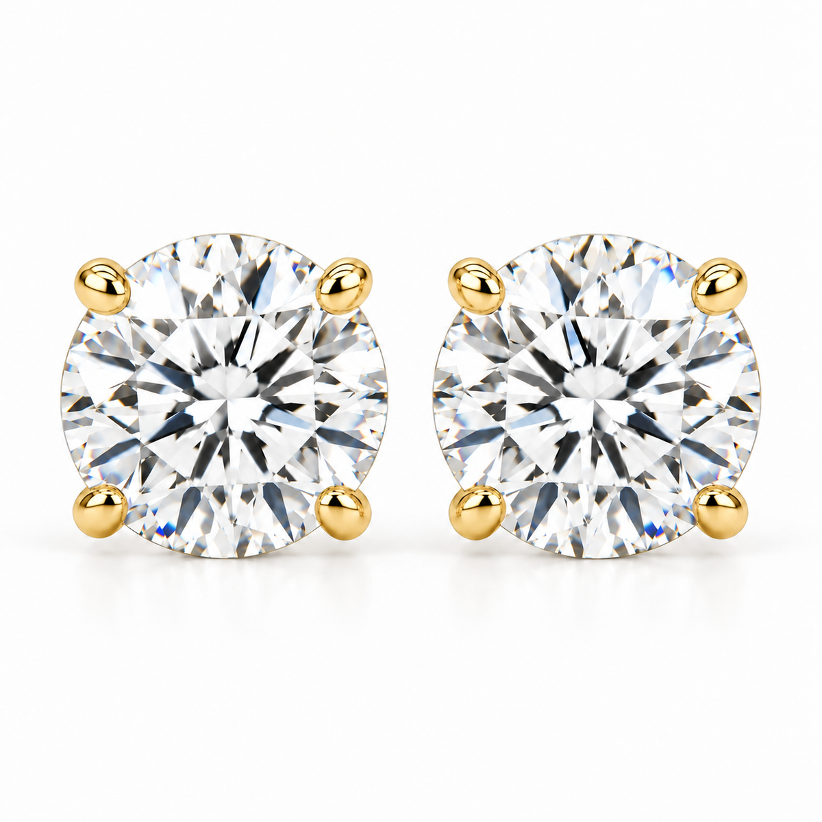 4 carat total weight lab-grown round brilliant diamond stud earrings in 14k yellow gold four-prong settings