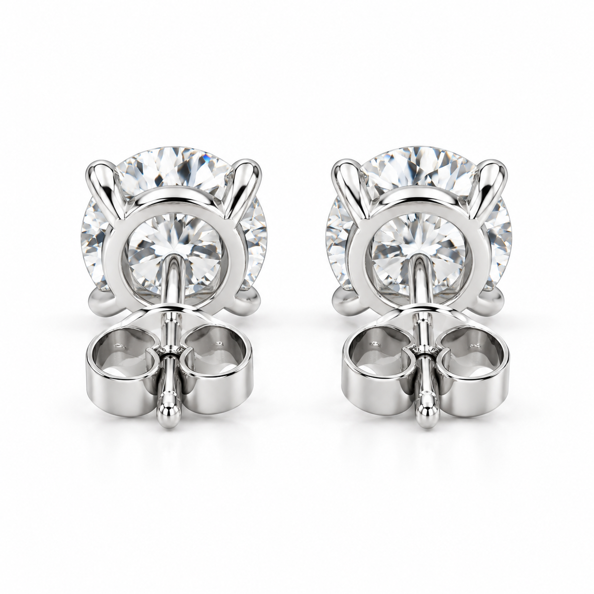 Back view of lab-grown diamond stud earrings showing the 14k white gold basket, post and push backs
